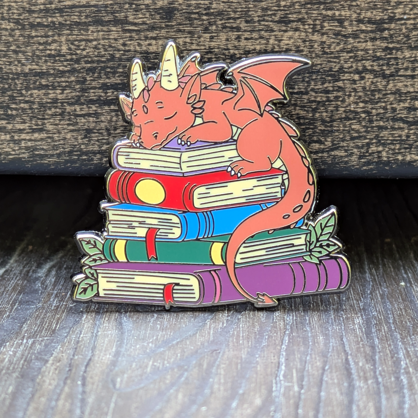 Dragon Sleeping on Top of Books Enamel Pin