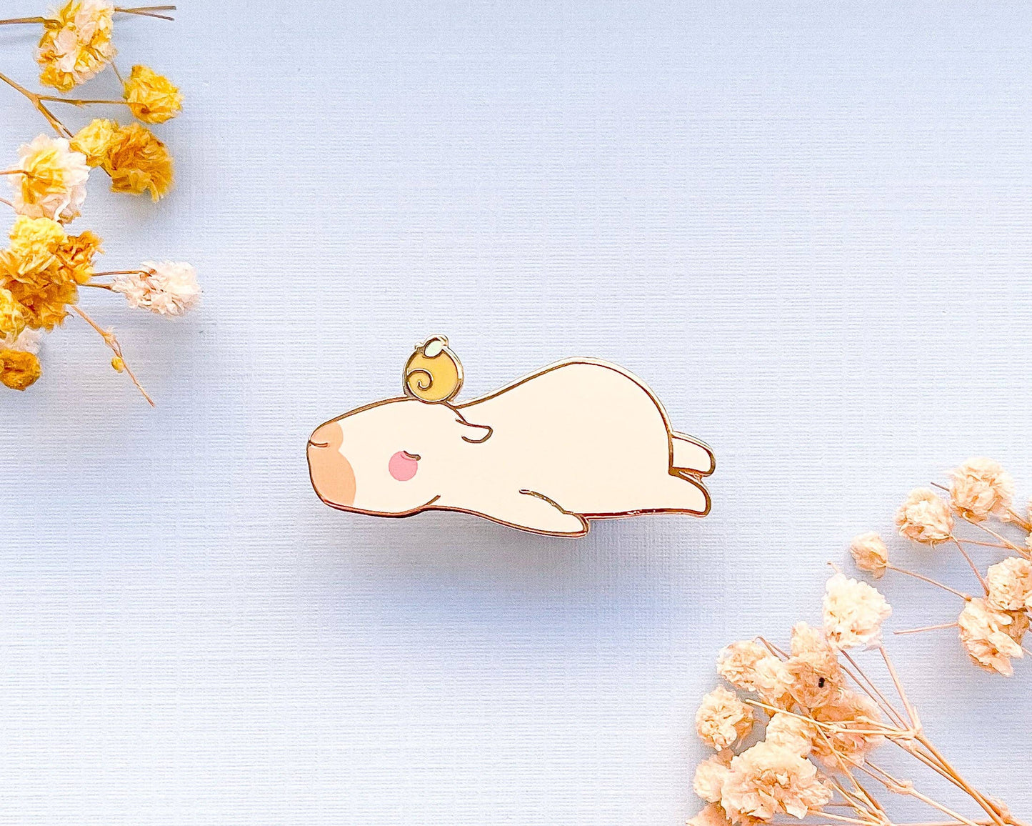 Curly the Capybara Lying Down Enamel Pin