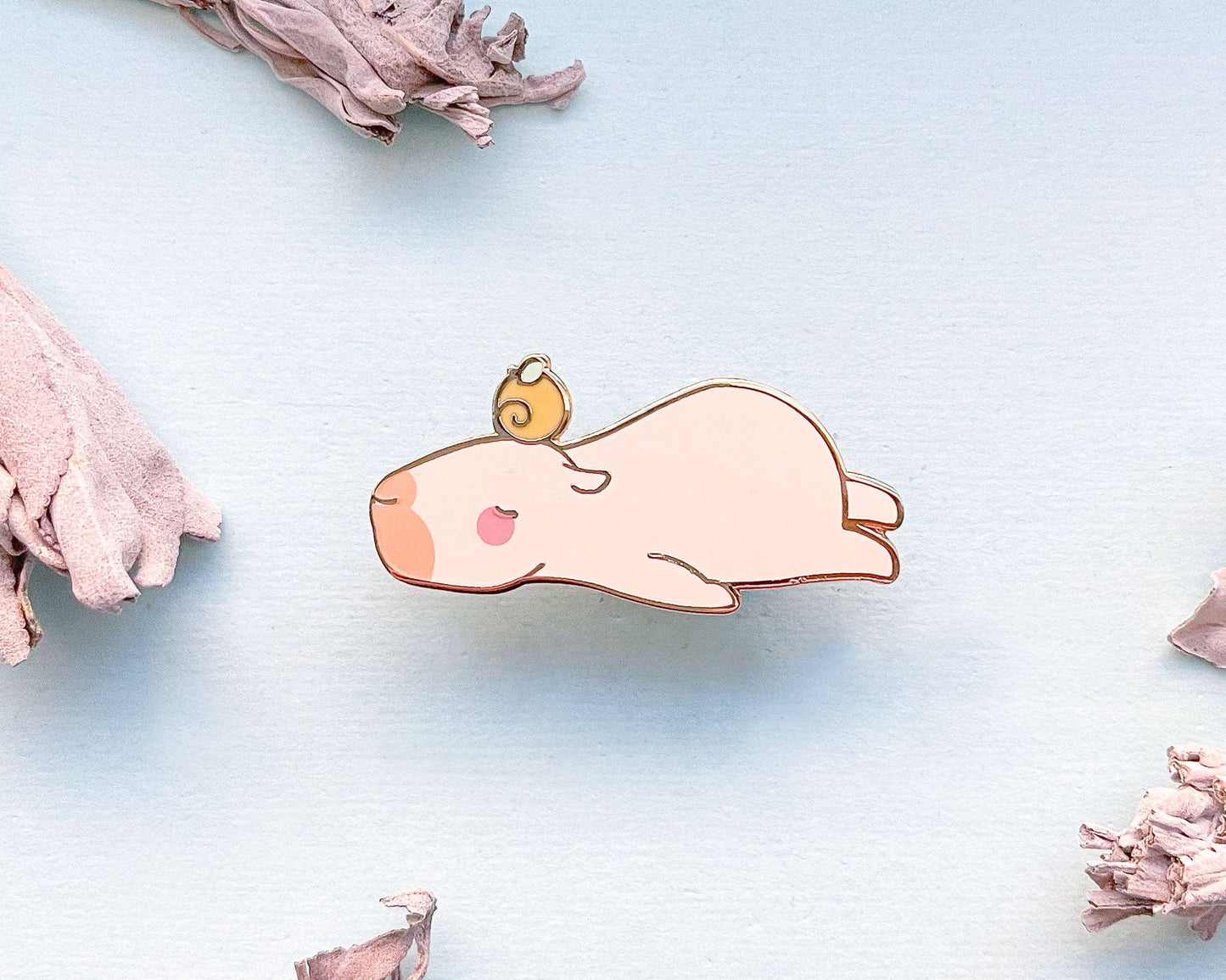 Curly the Capybara Lying Down Enamel Pin