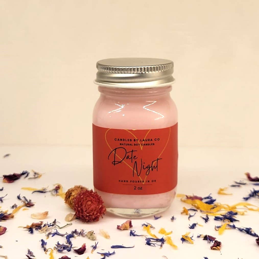 A picture of the Date Night candle, a pastel pink candle in a miniature mason jar.