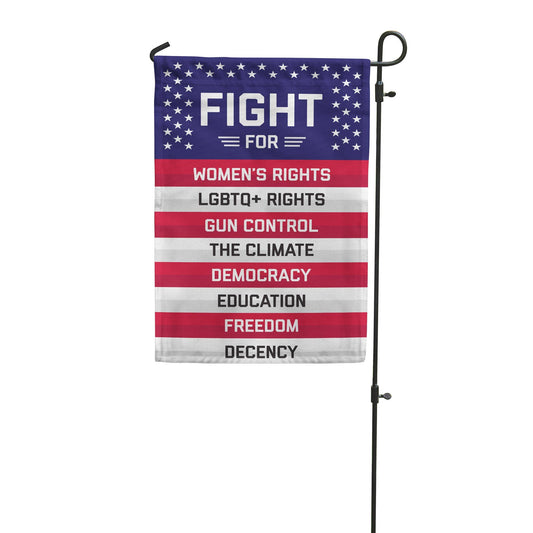 A lawn flag styled after the USA flag, with the text “FIGHT FOR WOMEN’S RIGHTS, LGBTQ+ RIGHTS, GUN CONTROL, THE CLIMATE, DEMOCRACY, EDUCATION, FREEDOM, DECENCY”.