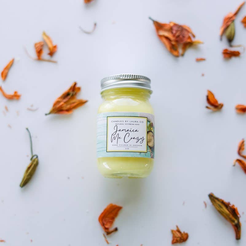 Image of the Jamaica Me Crazy candle, a yellow candle in a miniature mason jar.