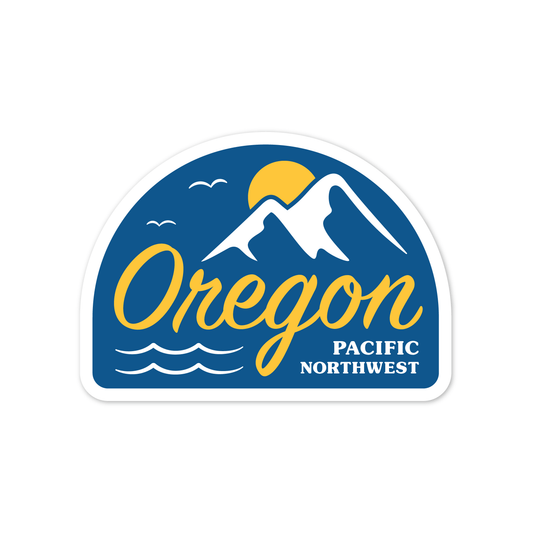 Sticker with a royal blue background, the word “Oregon” in cursive gold, and a stylized, simplified design of seagulls flying over an ocean and near a mountain, with the sun peeking out from behind the mountains.