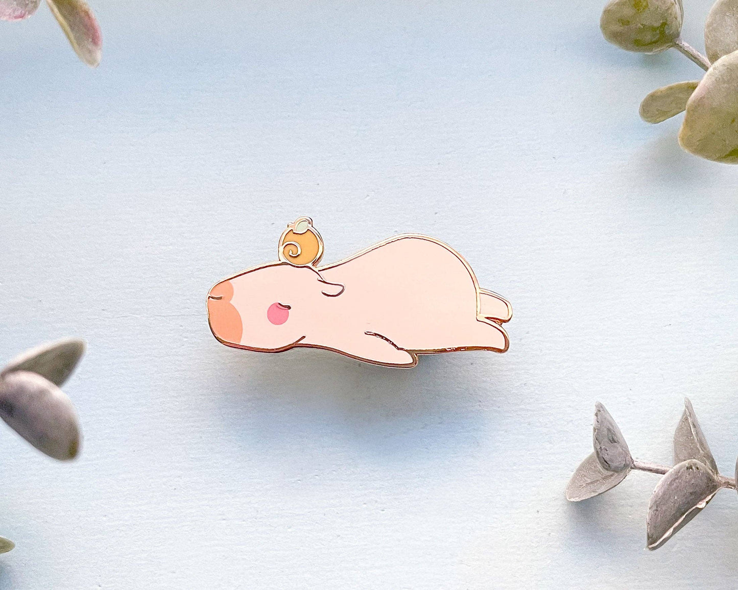 Curly the Capybara Lying Down Enamel Pin