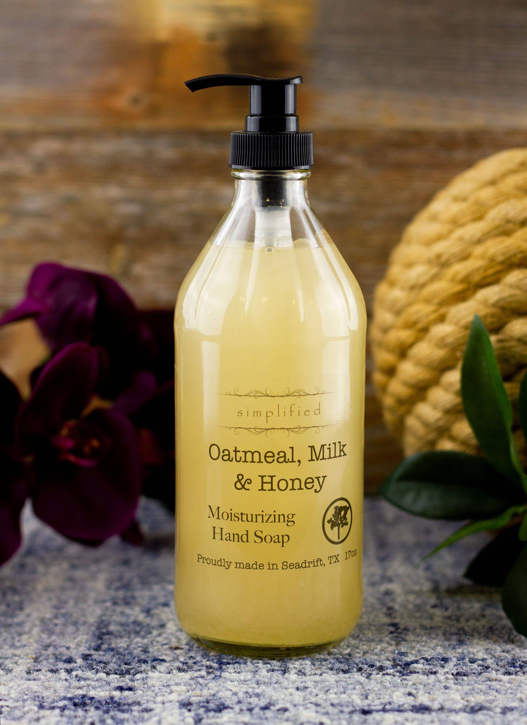Oatmeal Milk and Honey Hand Soap in a glass bottle with a pump dispenser